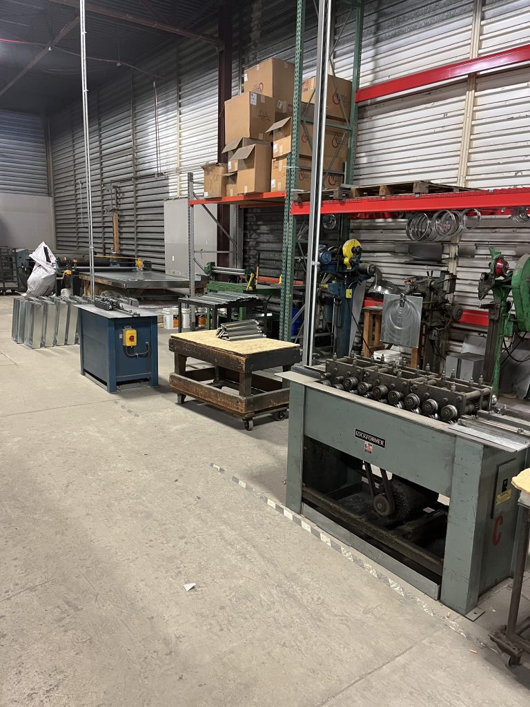 Sheet metal fabrication equipment and Lockformer machine in shop