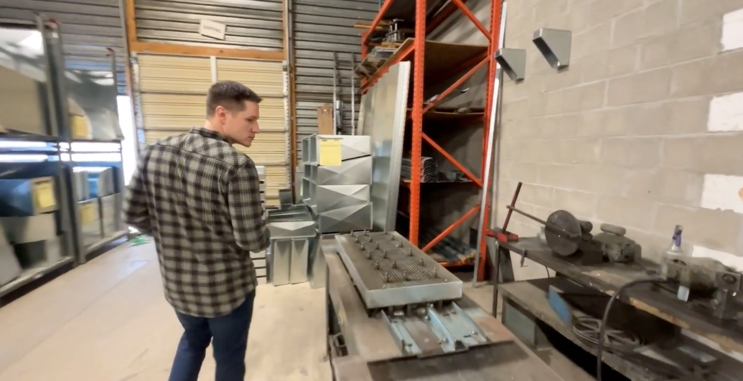 HVAC technician installing ductwork